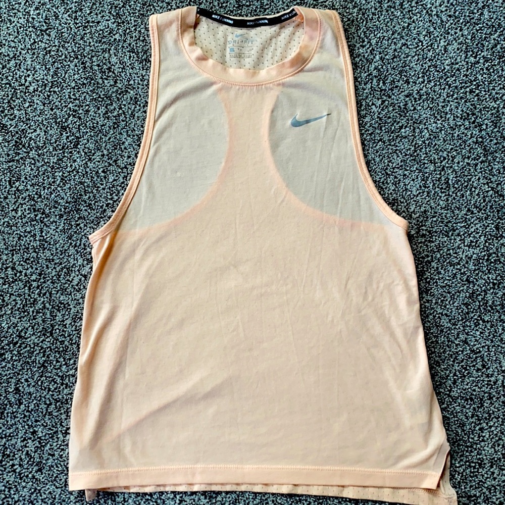 Orange creamsicle colored Nike racer back women’s tank.